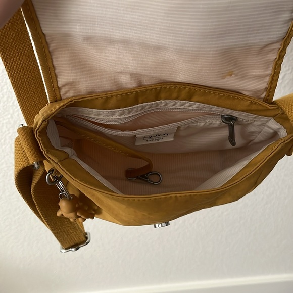Yellow/gold Kipling crossbody purse - Picture 3 of 3
